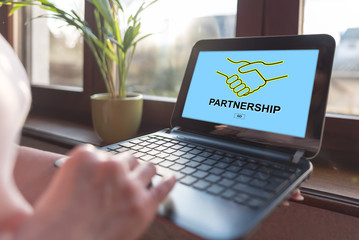 Partnership concept on a laptop screen