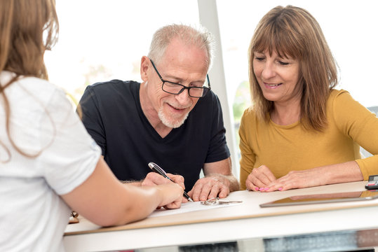 Senior couple meeting real estate agent