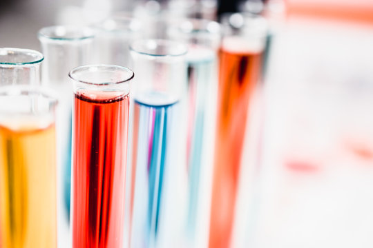 test tubes in laboratory. drug discovery, pharmacology and biotechnology concept. science and medical research background.