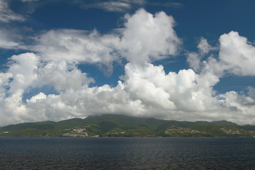 Sea, volcanic island and clouds. Martinique