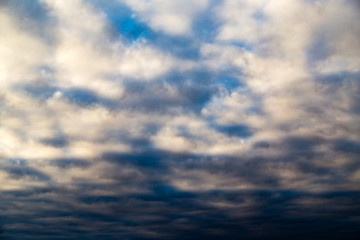 Obraz premium clouds in the sky at sunset as background
