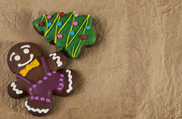 Christmas background with ginger cookies on wooden background