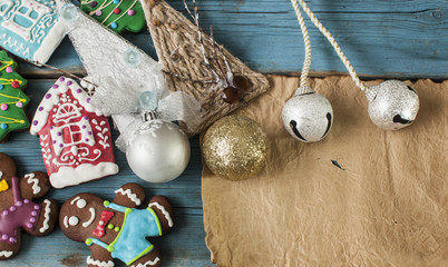 Christmas background with ginger cookies on wooden background
