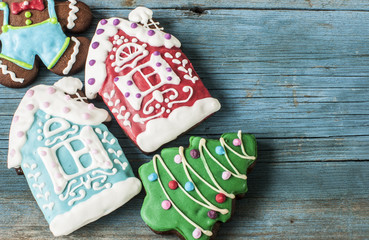 Christmas gingerbread cookies on old wooden background