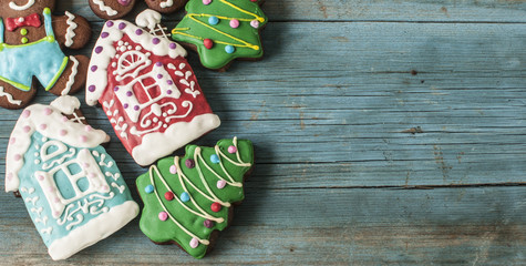 Christmas gingerbread cookies on old wooden background