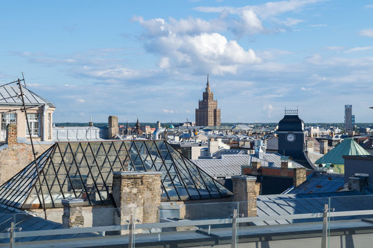 Building rooftops and the tower of the Latvian Academy of Science from the terrace of Galleria Riga, Latvia