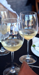 Celebration with a glass of white wine