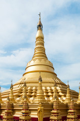 Fototapeta premium Simulate of Shwedagon Pagoda at Suwankiri Temple, Ranong, Thailand