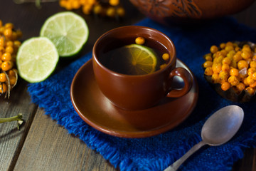 Sea buckthorn tea with lime, ready to drink.