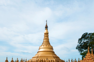 Fototapeta premium Simulate of Shwedagon Pagoda at Suwankiri Temple, Ranong, Thailand