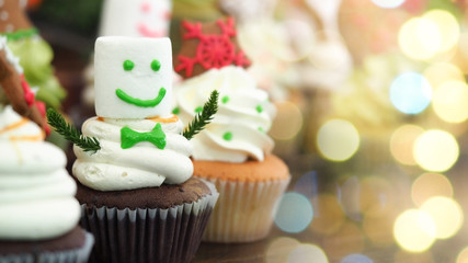 Cupcake decoration snowman for christmas and happy new year background