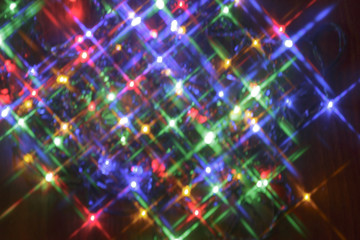 Beautiful abstract stars background. Defocused lights.