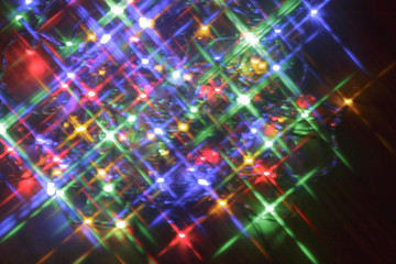 Beautiful abstract stars background. Defocused lights.