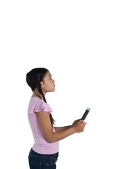 Fototapeta premium Girl holding digital tablet against white background