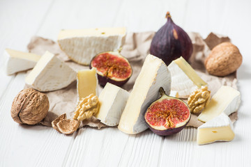 pieces of brie cheese with ingredients fig