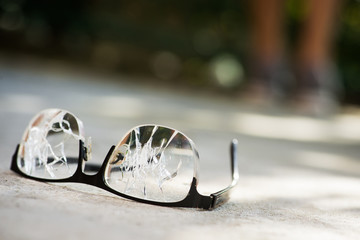 broken glasses on the asphalt