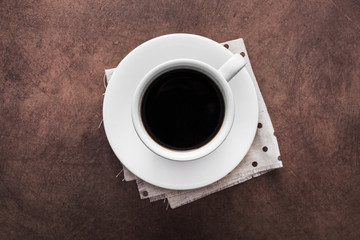 White coffee cup on napkin