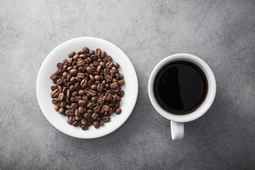 white coffee cup with roasted beans