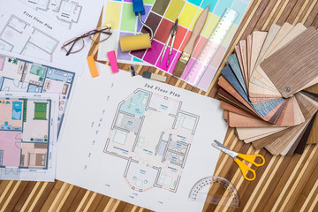 Architectural blueprint with wooden or paper samples and draw tools