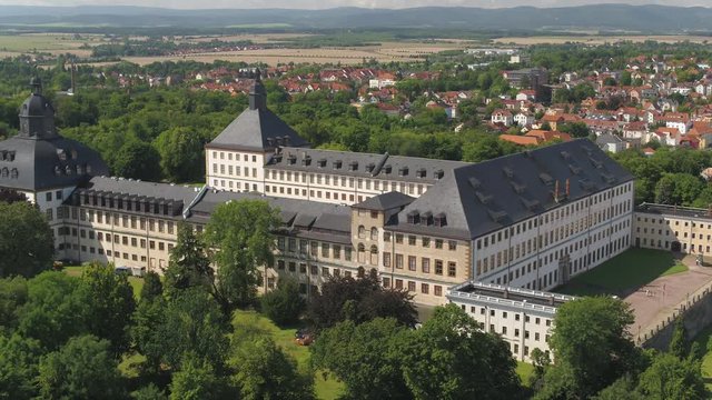 Aerial Drone moving slowly pan to right over old Gotha castle in Germany 4k cityscape