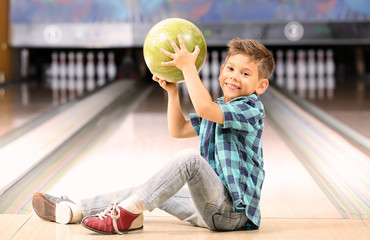 Cute little boy at bowling club