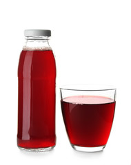 Fototapeta na wymiar Bottle and glass with juice on white background