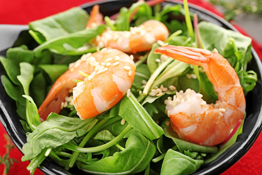 Bowl with yummy shrimp salad, closeup