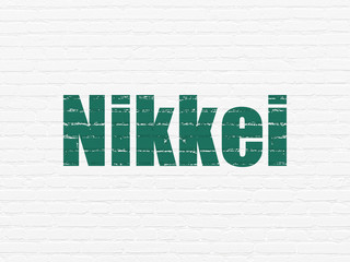 Obraz premium Stock market indexes concept: Painted green text Nikkei on White Brick wall background