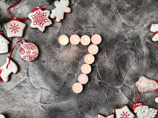 Date in calendar. December day. Christmas is coming. Advent. New Year and Christmas background. Number from candle light. Homemade Christmas cookies. 31 of December