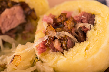 Detail of potato dumplings filled by smoked meat
