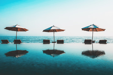 Beach umbrellas on an infinity pool