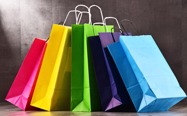 Composition with colorful paper shopping bags