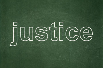Obraz premium Law concept: text Justice on Green chalkboard background