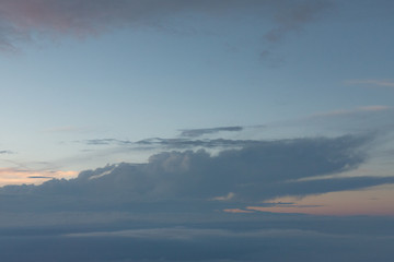 Fototapeta na wymiar View from airplane to white clouds