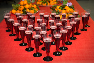 Glasses with champagne and fruits on a beautifully decorated holiday table