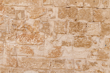Yellow castle old stone pattern texture wall close