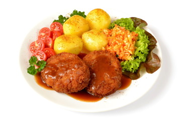 kotlet mielony z ziemniakami surówką i pomidorem 