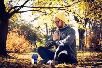 Man exercise yoga. Lotus position.