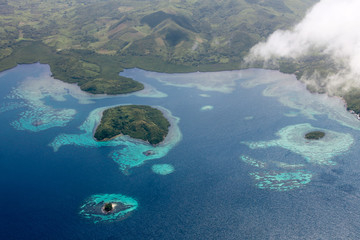 Aerial view over Philippine islands and deserted beaches
