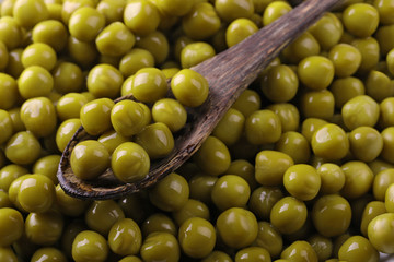 pile of canned green peas