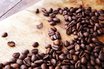 coffee beans on rustic brown ground. Roasted coffee beans concept
