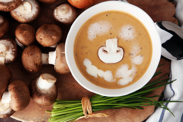 Mushroom cream soup with herbs and champignons
