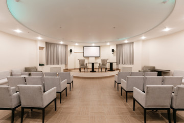 Row of chairs in boardroom. seats in an empty conference room