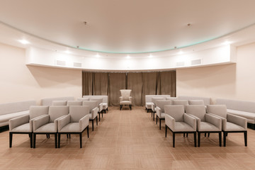 Row of chairs in boardroom. seats in an empty conference room
