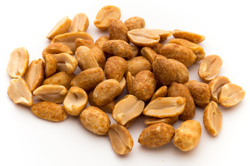 Peeled peanuts on the isolated background.