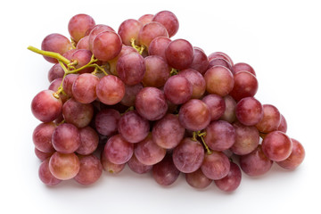 Ripe red grape isolated on white.