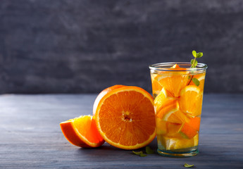 Detox Infused Water with orange.Healthy Beverage.Food  diet concept.Vegetarian.Copy space for Text. selective focus.