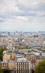 Paris cityscape taken from Montmartre. Cloudy day