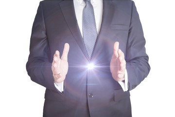 Close up of businessman in blue suit holding something on white background 