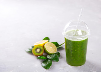 Smoothies Green. Drink Cocktail Spinach,Apple,Kiwi,Lemon,lime,avocado.Food or Healthy diet concept.Vegetarian.Copy space for Text. selective focus.